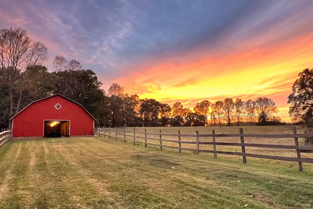 Exterior of a barn in the Swannanoa Valley — land and structure carrying the valley's art history forward